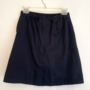 This is a Land’s End navy blue skirt.